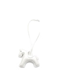 White pony bag charm