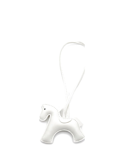 White pony bag charm